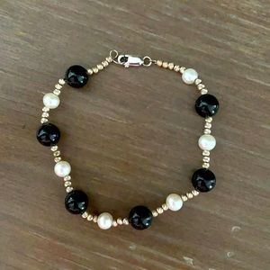 Silver, pearl and black stone bracelet